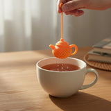 Infuseur à thé en forme de théière