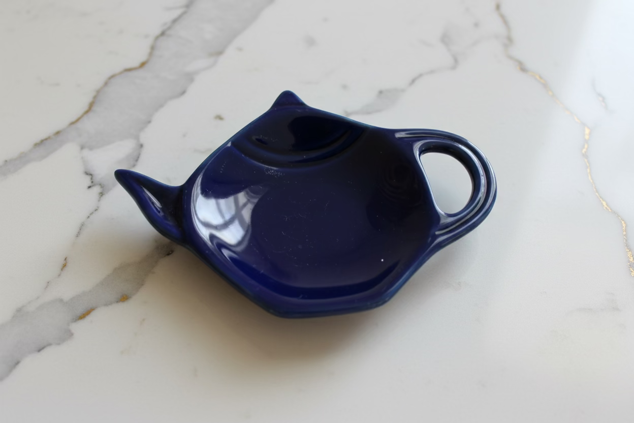 Porte sachet de thé en forme de théière 