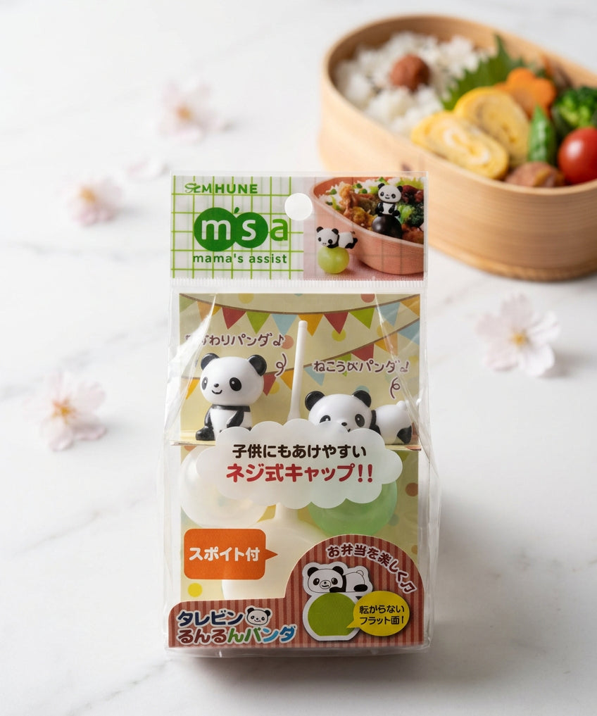 Petites bouteilles à sauce pour bento avec bouchons décorés de pandas.